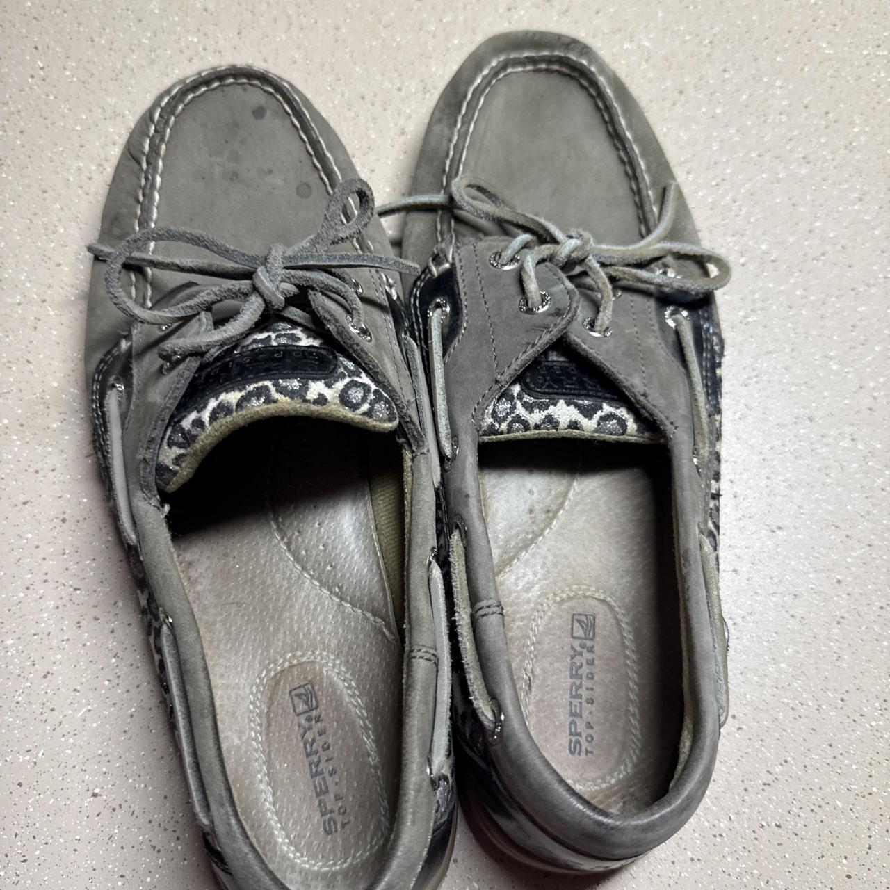 Gray Sperry boat shoes with leopard print accents...