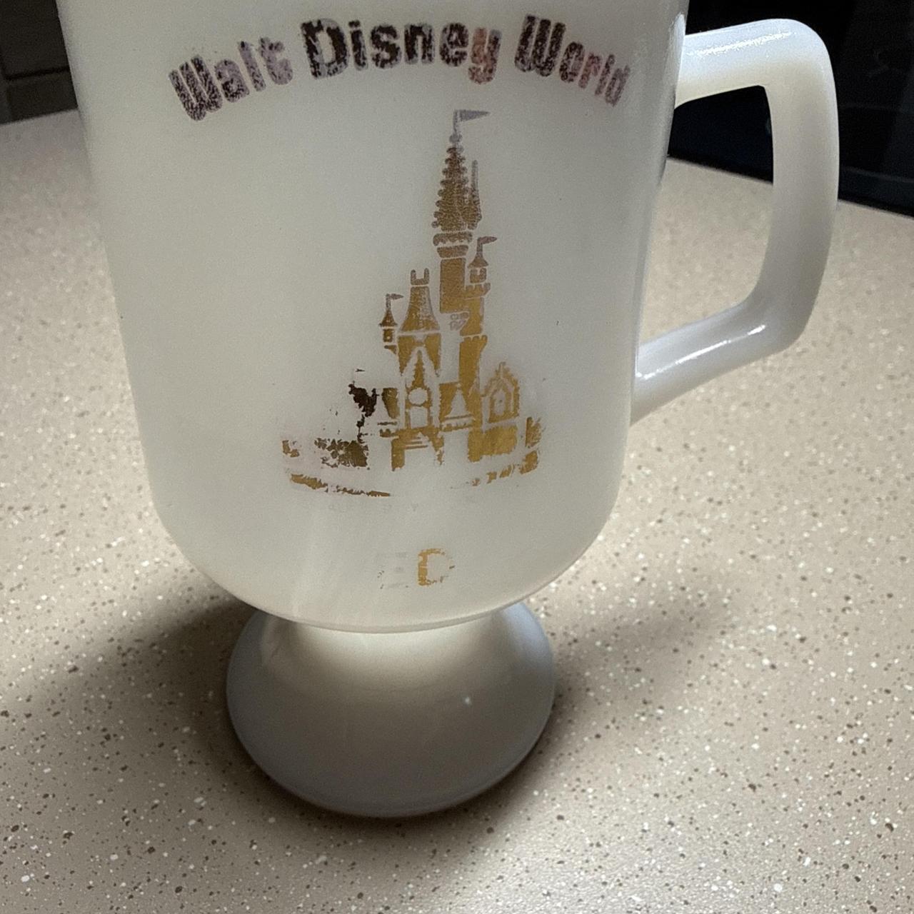Disney World white milk glass mug with gold castle...