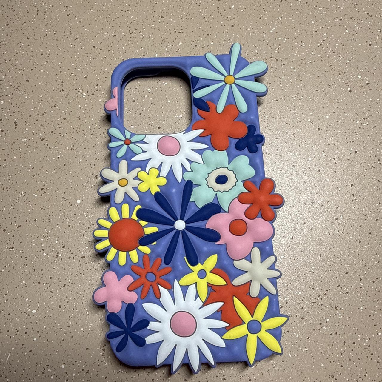 Blue phone case with 3D flowers in multiple colors...