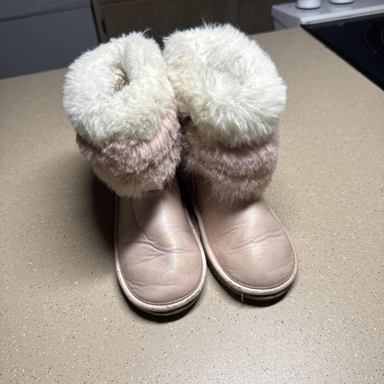 Pink faux fur boots with white fluffy trim, size US...