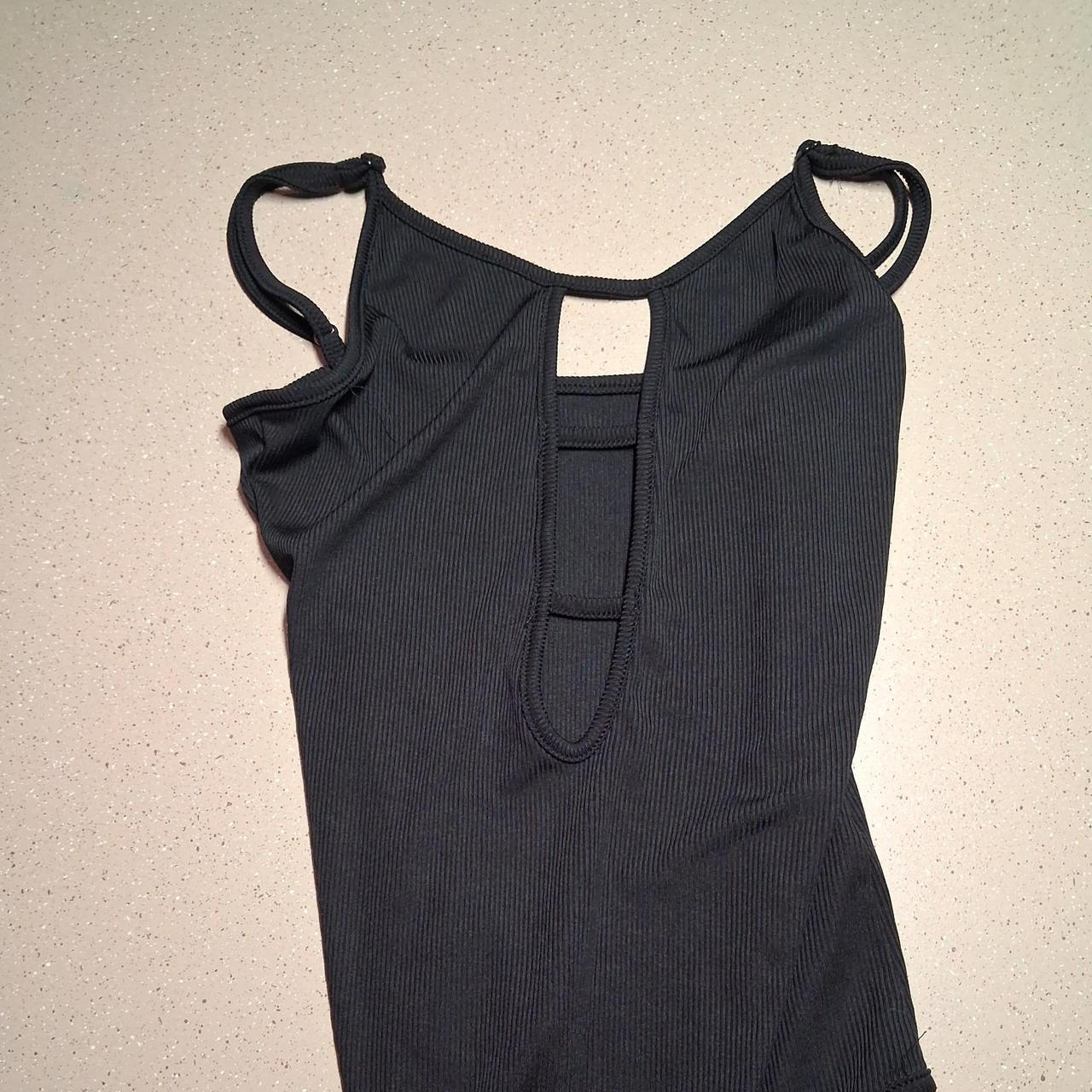 Black ribbed bodysuit with cutout detail #bodysuit...